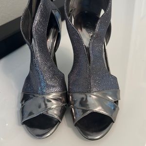 Guess size 10 chrome shoes. NWOB!